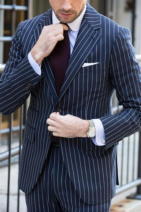 navy blue pinstripe suit combinations